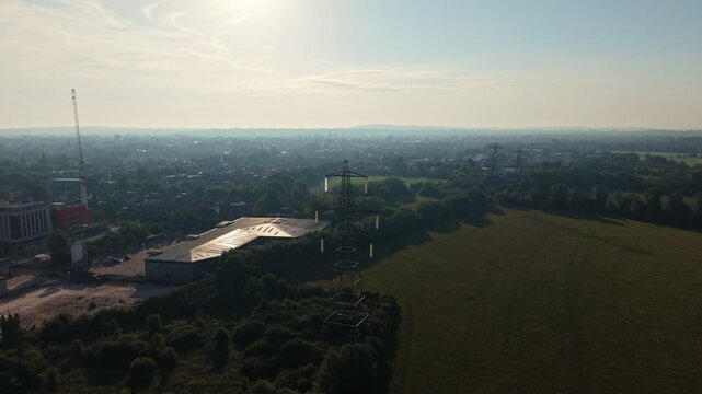 Aerial video of UK power grid, high voltage power lines in Oxford