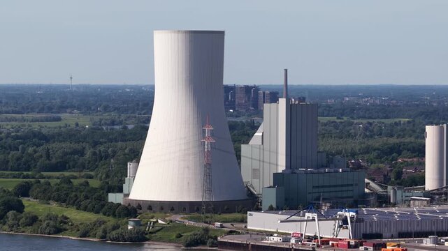 Aerial drone view of Duisburg Walsum power plant, showing coal energy infrastructure, chimney, industry and Rhine landscape.