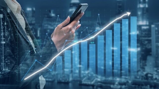 A business professional holds a smartphone while viewing a digital financial growth chart against a city skyline, symbolizing progress and technological advancement. Copula