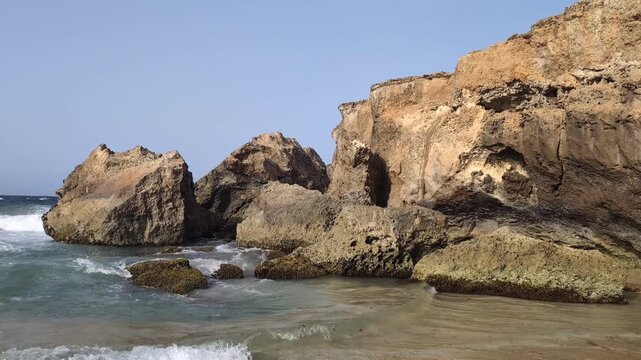 Waves washing up on a rocky shore