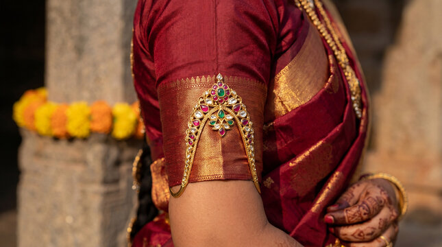 Traditional Indian Armlet Jewelry on Red Saree