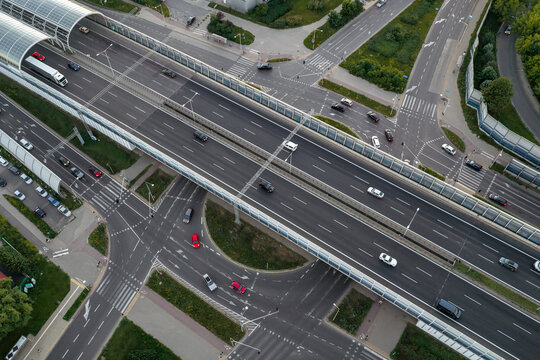 Aerial view of the Trasa Torunska expressway with multi-lane traffic and sound barriers in Warsaw, Masovian Voivodeship, Poland.