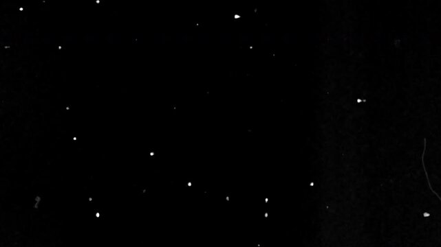 Filmgrain celestial bodies in deep black outer space, ideal for astronomy, science, and educational projects about space exploration and astronomy.