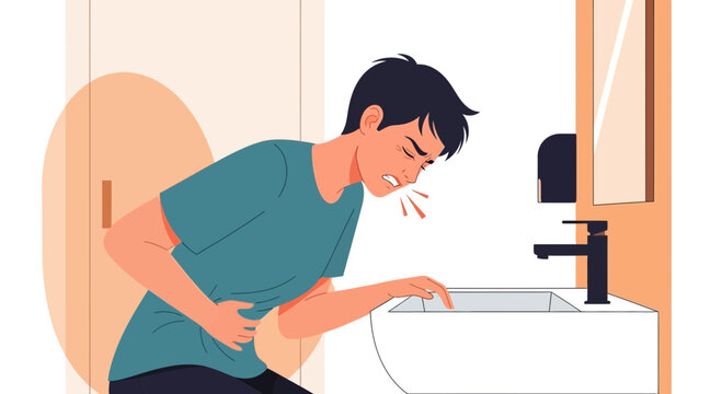 Unwell Young Man Struggles With Sickness, Bent Over In Bathroom, Seeking Help