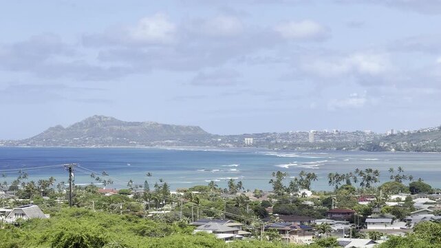 Maunalua Bay. Hawai'i Kai Lookout, East of Honolulu, Oahu, Hawaii.  Pacific Ocean. In the distance lies Diamond Head (a volcanic tuff cone).
