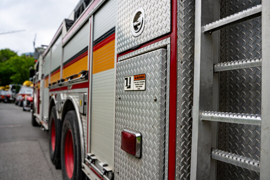 Close up of ladder fire truck side exterior.