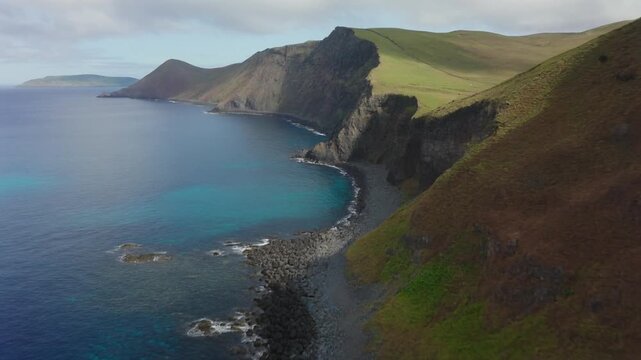 Senkaku bay aerial view of rugged cliffs and blue ocean water