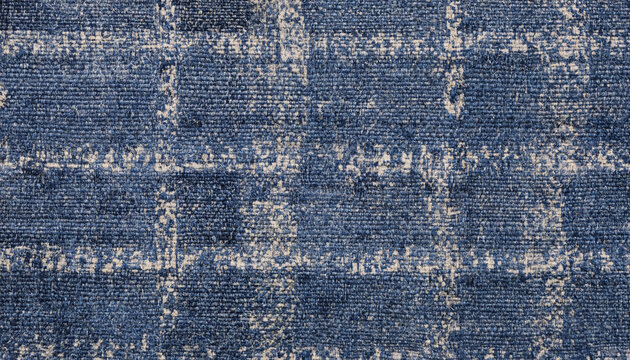 Abstract dark blue fabric texture with a distressed grid pattern