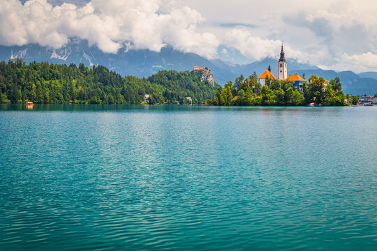 Famous place with beautiful church on the green island, Slovenia