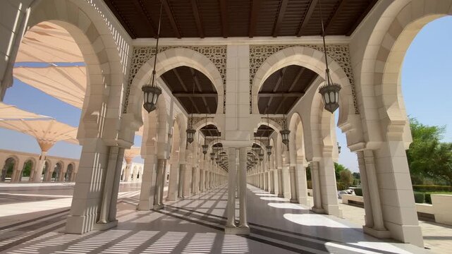 A sunlit dome and ornate interiors of Sheikh Khalifa Bin Zayed Al Nahyan Mosque in Al Ain City radiate grandeur