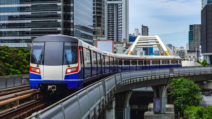 Obraz premium Close-up The Bangkok Mass Transit System (BTS) is serving the public, tourists, and commuters through the city center, representing Bangkok's public rail transport system in Thailand.