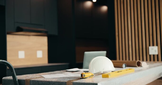 Maintenance, renovation and toolbox with black man in kitchen for home improvement or upgrade. Construction, equipment and service with mature contractor in modern apartment for building project