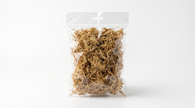 Clear plastic bag filled with dried shredded brown seaweed isolated on white background.