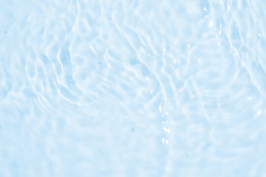 Abstract transparent water shadow surface texture natural ripple on blue background