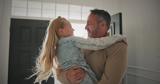 Child, hug and greeting with happy dad in home for welcome, return or bonding by entrance door. Daughter, kid or embrace with smile, father or arrival for reunion, surprise or love together in house