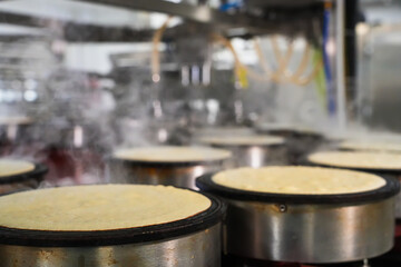 Obraz premium Industrial food production of pancakes