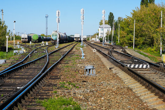 A railway park with freight trains and tracks.