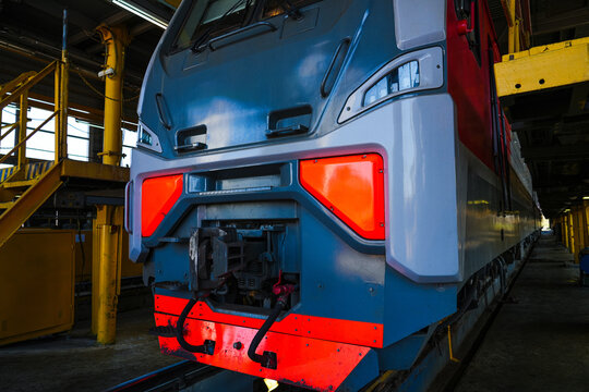 Modern train in service depot for inspection.