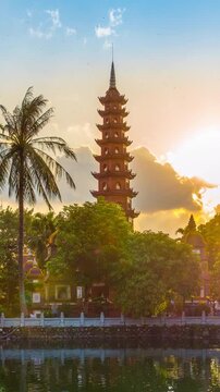 Time lapse of Tran Quoc Pagoda at sunset in Hanoi, Vietnam. Vertical