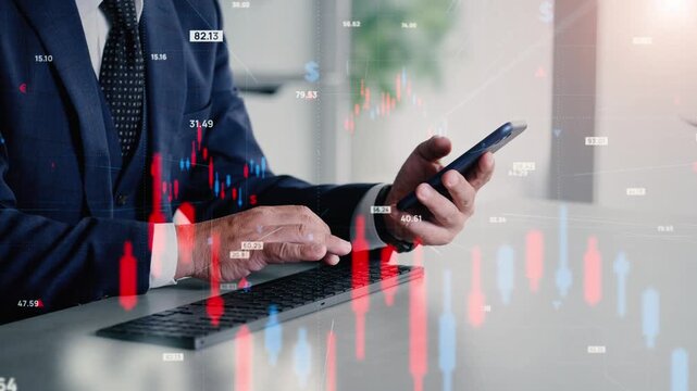 Concept of a man using a smartphone and computer, and financial technology.
