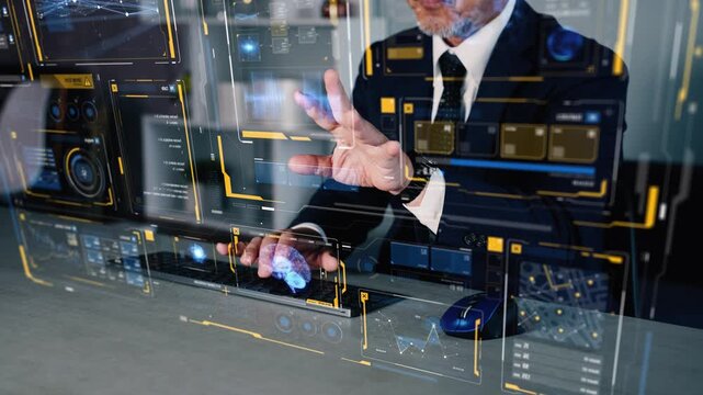A man operating a hologram interface.