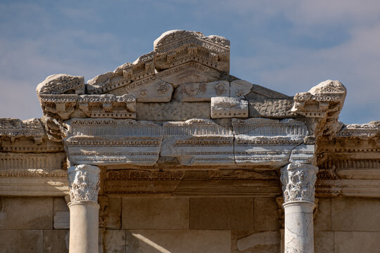 The grand entrance and highly decorated front facade of the Library of Celsus in the UNESCO World Heritage site of Ephesus.