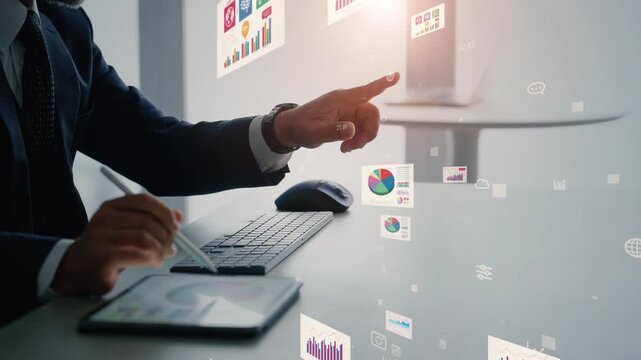 Concept of a man working in an office and digital data.