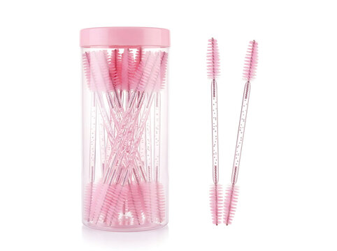Pink plastic container with pink spoolie brushes