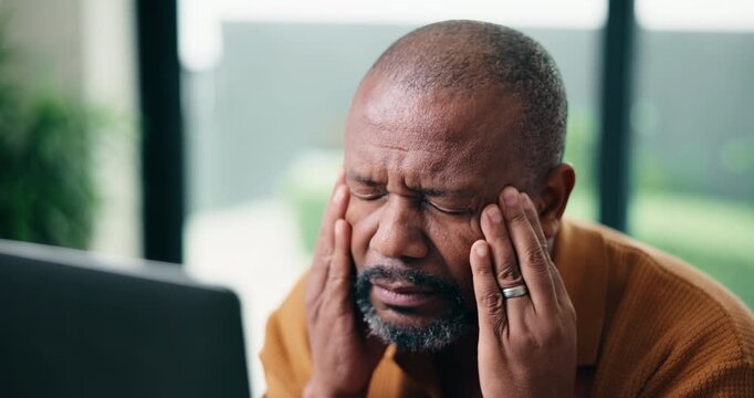 Man, headache and glasses in home office with computer, wrong prescription lens or remote work stress. Tired, mature black person and freelancer in house with eye strain, spectacles and glitch on pc.