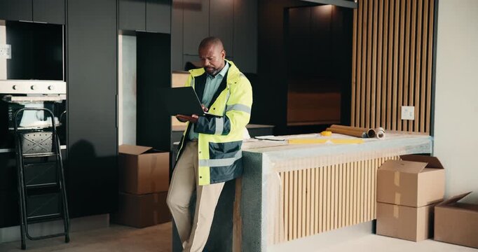 Laptop, renovation and thinking with black man in kitchen for home improvement or upgrade project. Computer, planning and real estate with mature construction worker in apartment for property update
