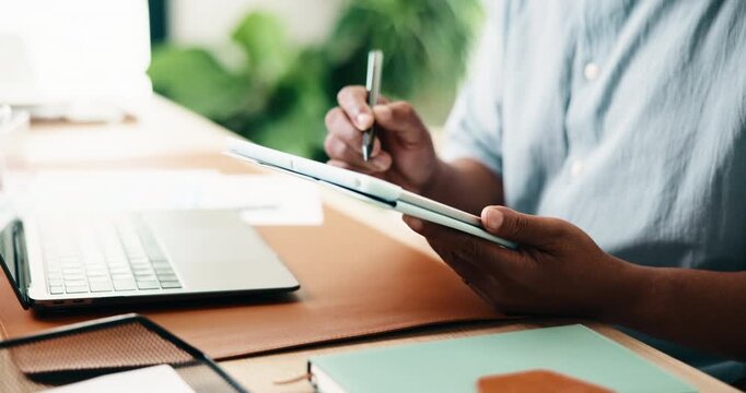 Man, hands and writing with tablet in home office for web design, remote work or online planning. WFH, male designer or stylus with technology for UX, UI development or creativity on desk in house