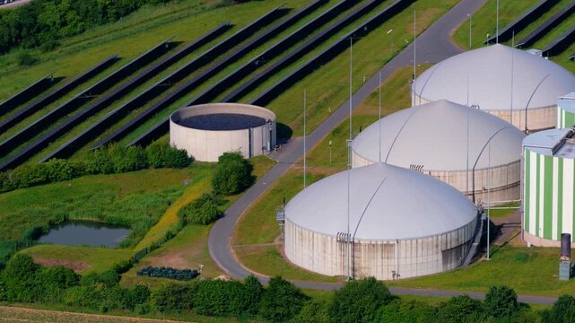 Aerial Drone Video Biogas Plant Tanks Solar Farm Close-Up View