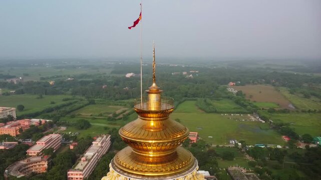 A close-up drone flight around the main dome of the Vedic Planetarium