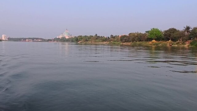 travel along the Ganga River near the Vedic Planetarium