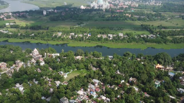 drone flight back with a view of the Jalangi River and the Vedic Planetarium