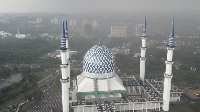 Horizontal Drone Flyby of Sultan Salahuddin Abdul Aziz Mosque in Rain, Shah Alam, Malaysia, 4K