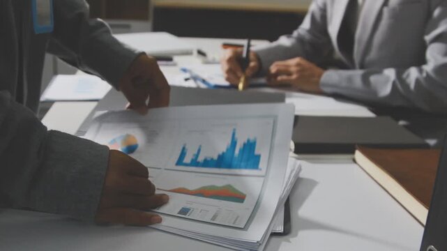 Accounting company provide finance and taxation planning for profitable cash flow, Auditor and accountant team working in office, analyze financial data and accounting record with calculator.Insight