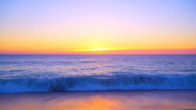 Slow motion pan of ocean waves rolling onto sandy beach at sunset with gentle swell and reflective water