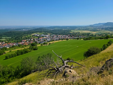 germany, spectacular aerial panorama overlooking kohlberg village with neuffen valley and neckar valley surrounded by vibrant summer countryside