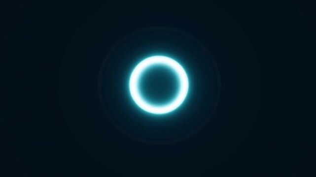 Slow motion static shot of glowing neon ring pulsing and expanding against dark studio background with soft blue halo light