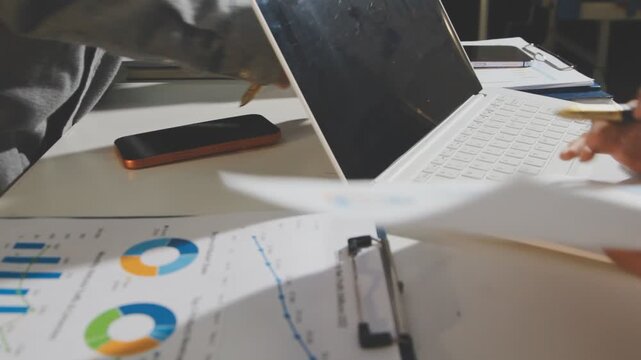 Accounting company provide finance and taxation planning for profitable cash flow, Auditor and accountant team working in office, analyze financial data and accounting record with calculator.Insight