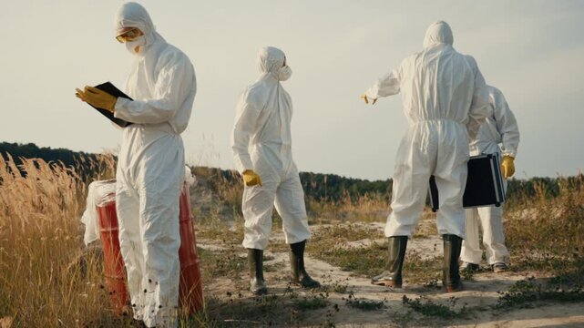 The Hazardous Waste Management Team is dressed in Protective Gear for safety and prevention