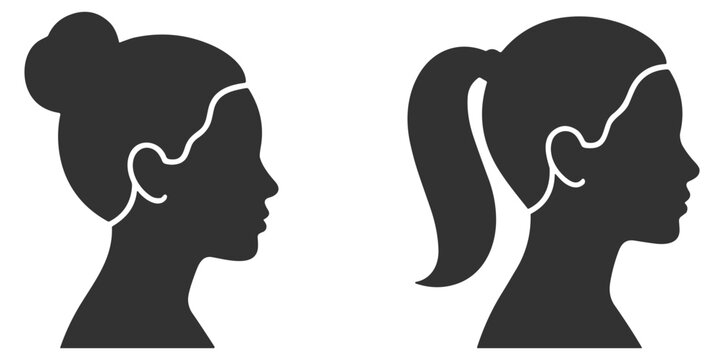 Silhouettes of two female profiles with different hair styles hair bun and ponytail vector illustration on transparent background