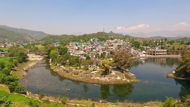 Wide Establishing Shot Of Historic Baijnath Temple And Village On Gomti River Bageshwar