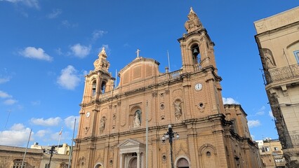 Fototapeta premium Townscape with one of the churches on the island of Malta