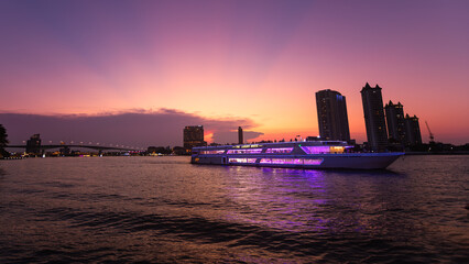 Obraz premium Sunset at the riverfront by the Hatch Dome, at the port of the capital, Bangkok, Thailand.