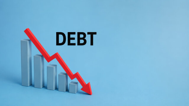 Debt reduction financial concept with downward red arrow on bar graph, blue background, copy space, symbolizing successful debt management and economic improvement