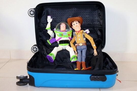 Salvador, Brazil - June 27, 2026. Luggage bag with Buzz Lightyear and Woody from Toy Story on it. Children's toys. Toy Story movie. 