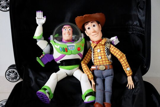 Salvador, Brazil - June 27, 2026. Luggage bag with Buzz Lightyear and Woody from Toy Story on it. Children's toys. Toy Story movie. 