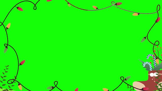 Christmas light strings form a decorative border around an empty green screen space for seasonal messaging.